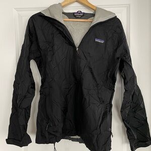Women’s Patagonia black rain jacket, size medium